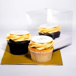 Personalised cupcakes that are branded and individually boxed that's created by OhMyCake.
