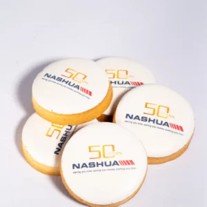 Personalised macarons created for Nashua by OhMyCake for corporate orders.